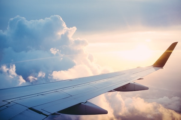 clouds and airplane wing